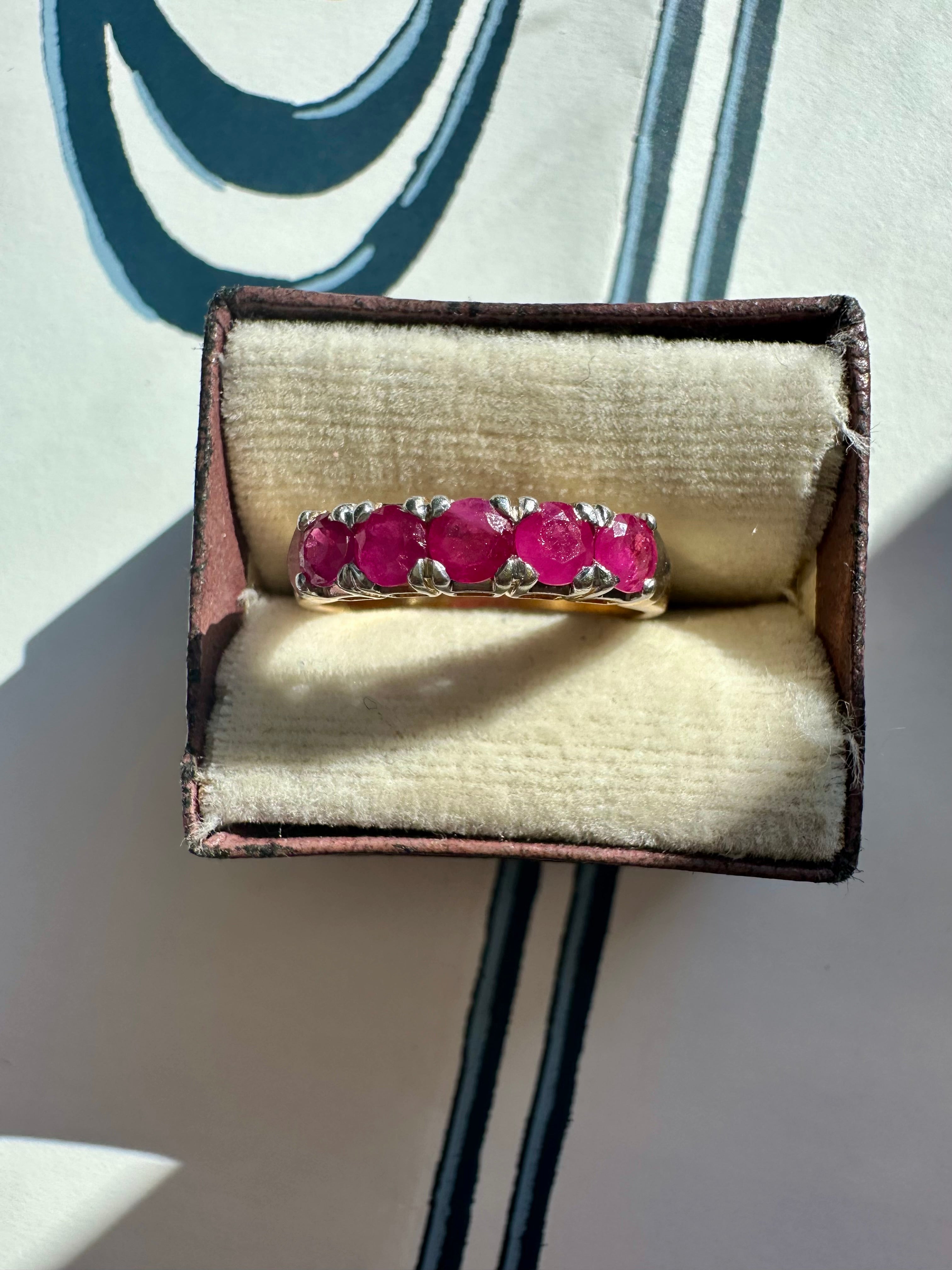 ruby band set in 18k yellow gold