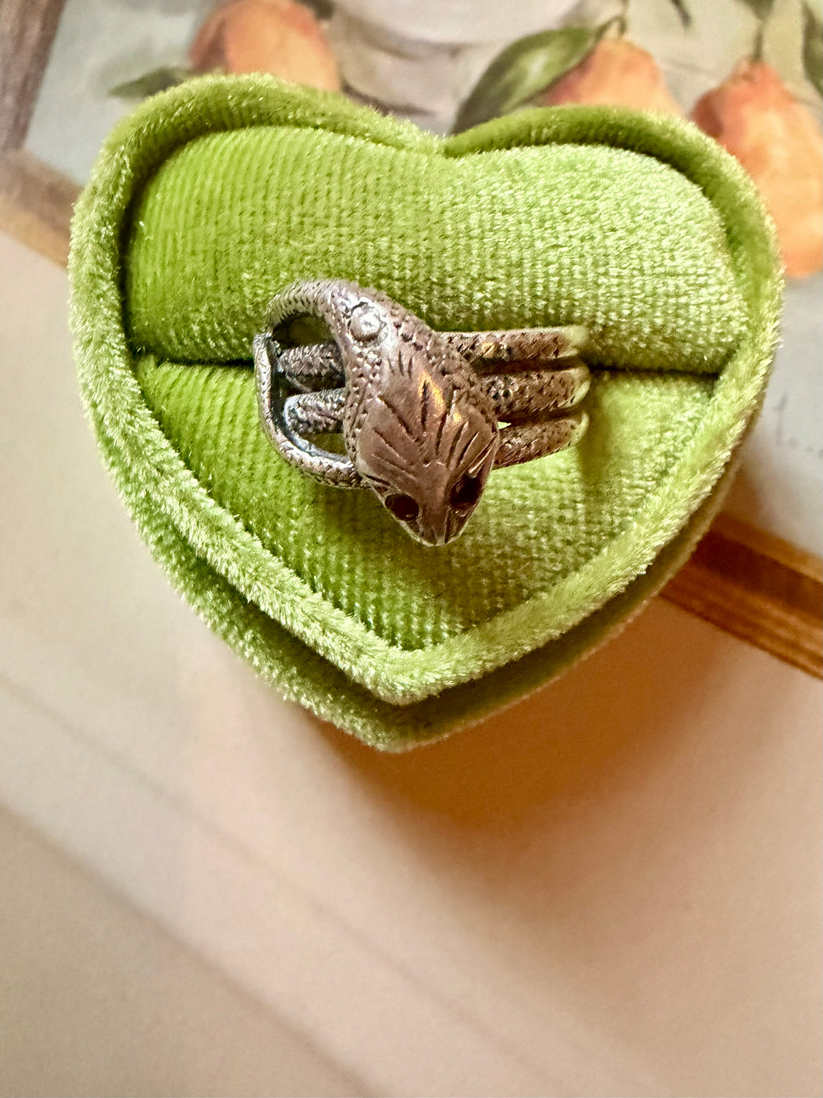 silver and garnet snake ring