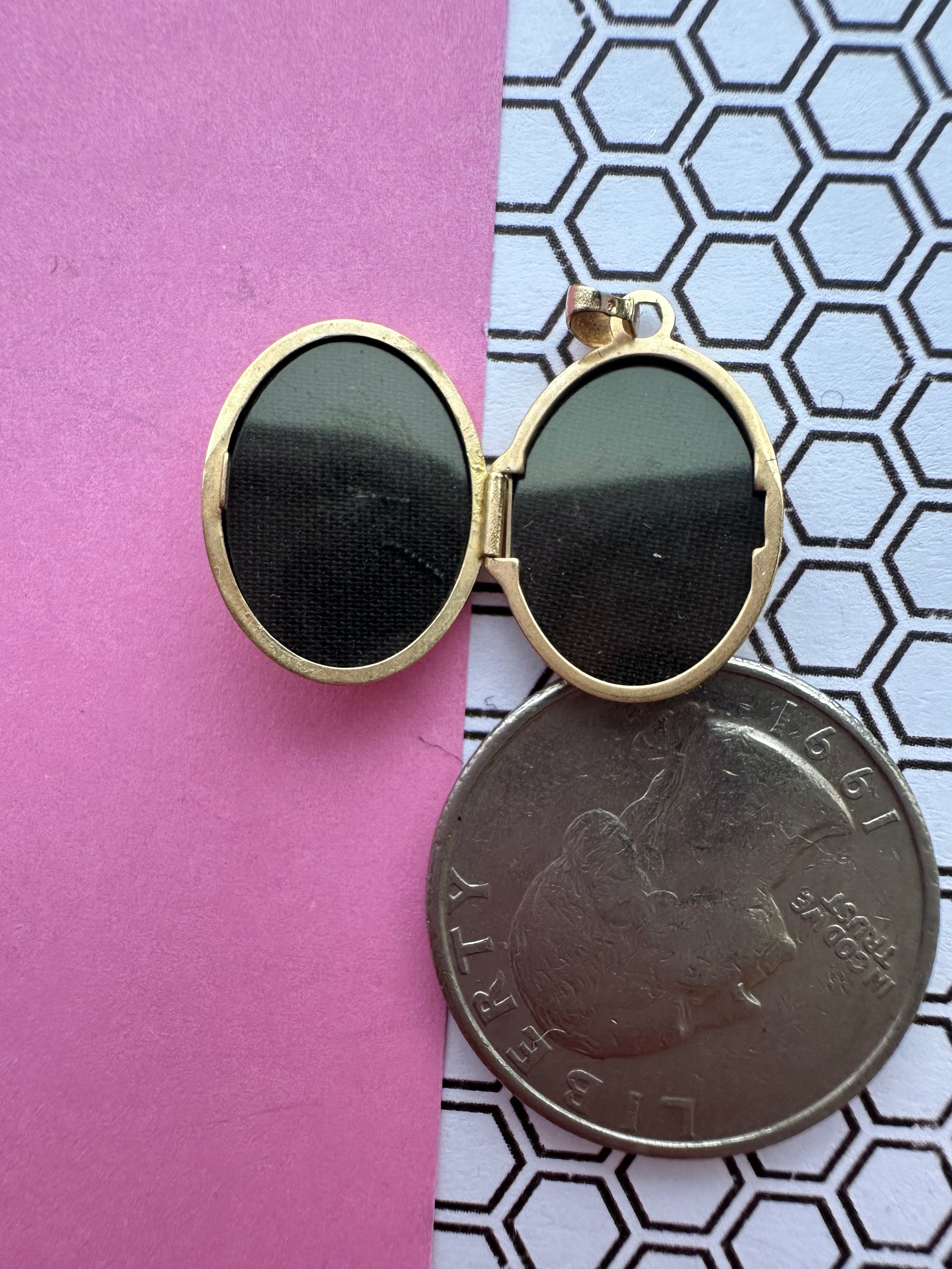 oval floral locket engraved H