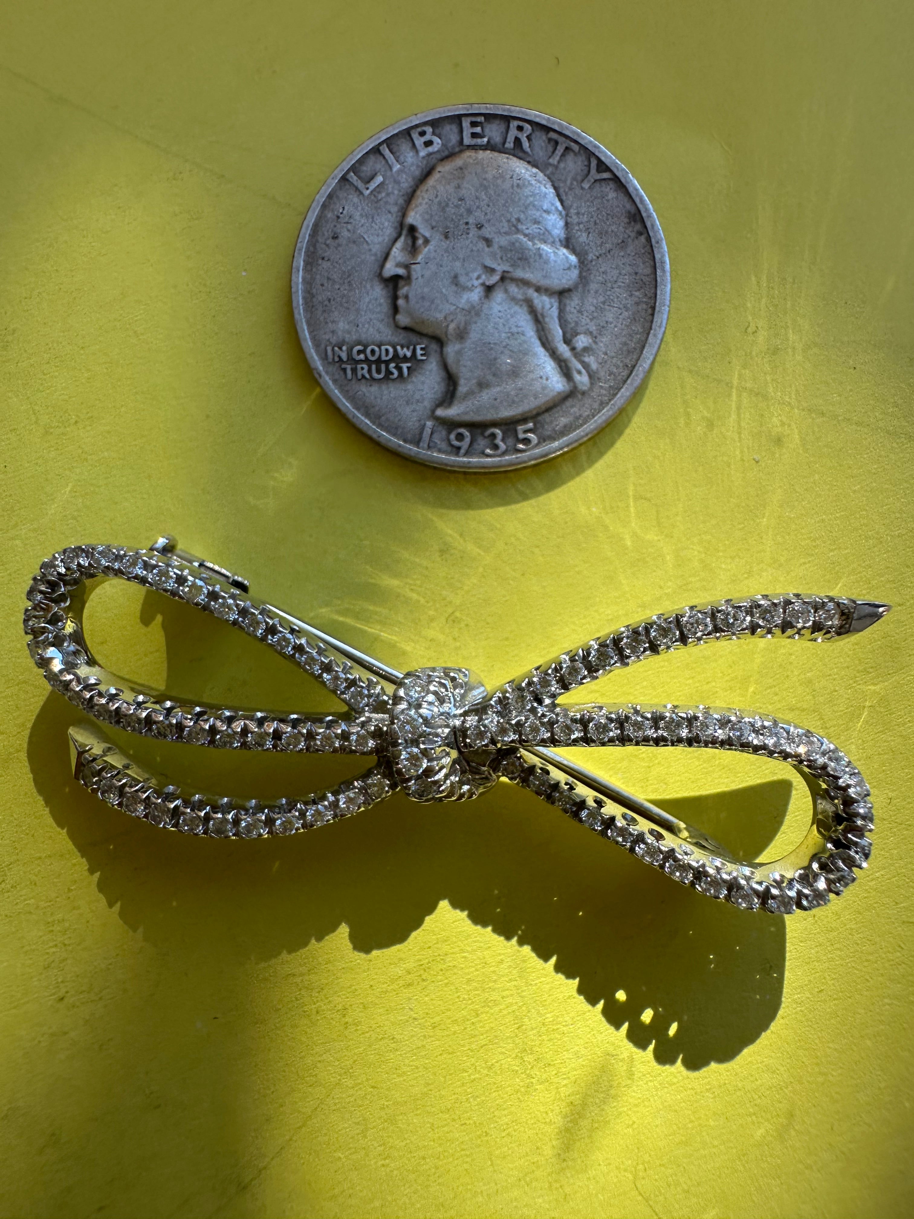 spectacular 18k white gold and diamond bow