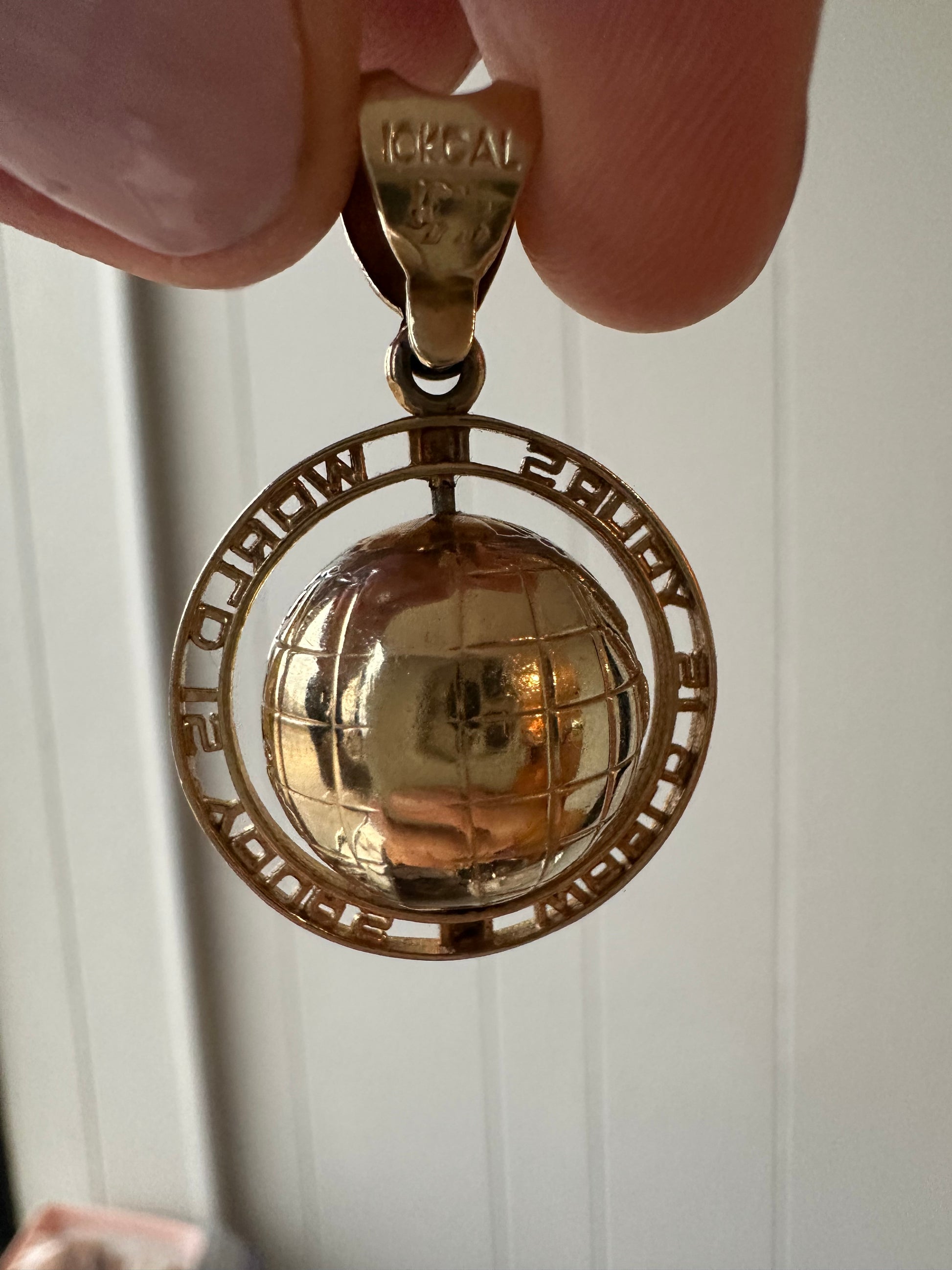 spinning globe charm