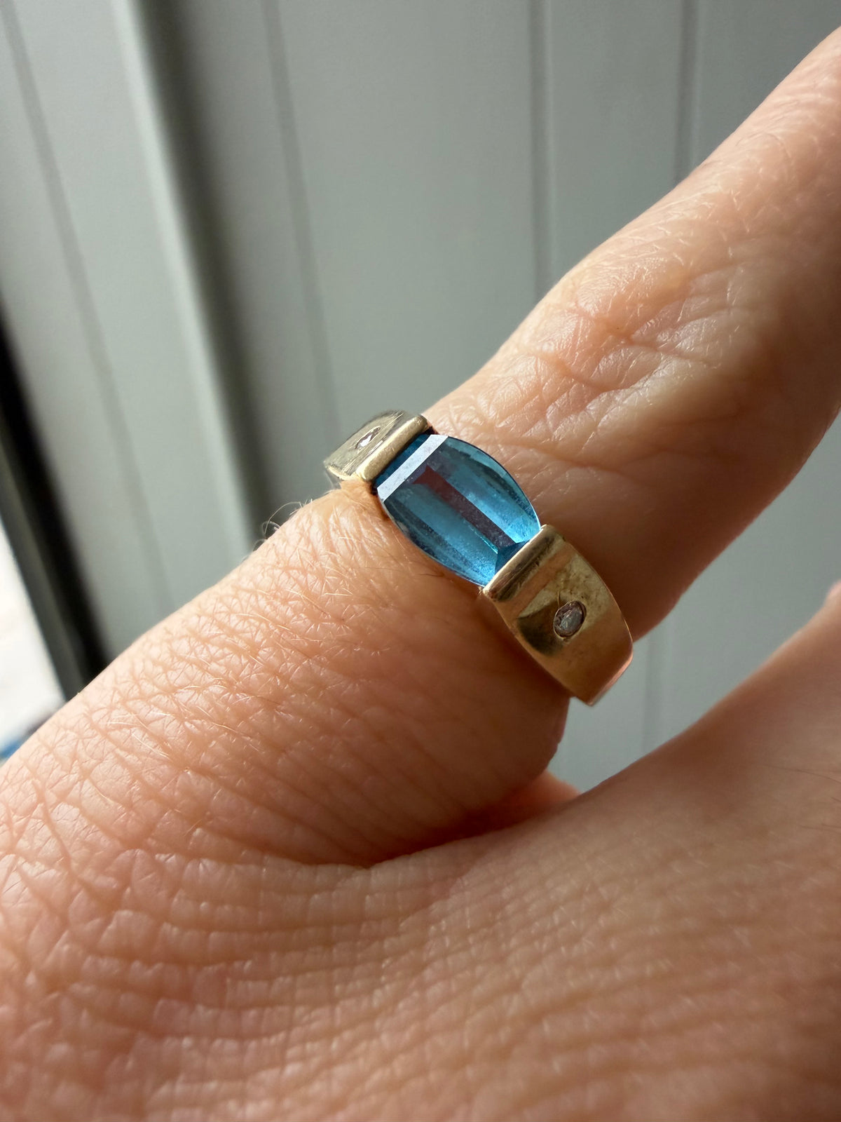 blue topaz and diamond band