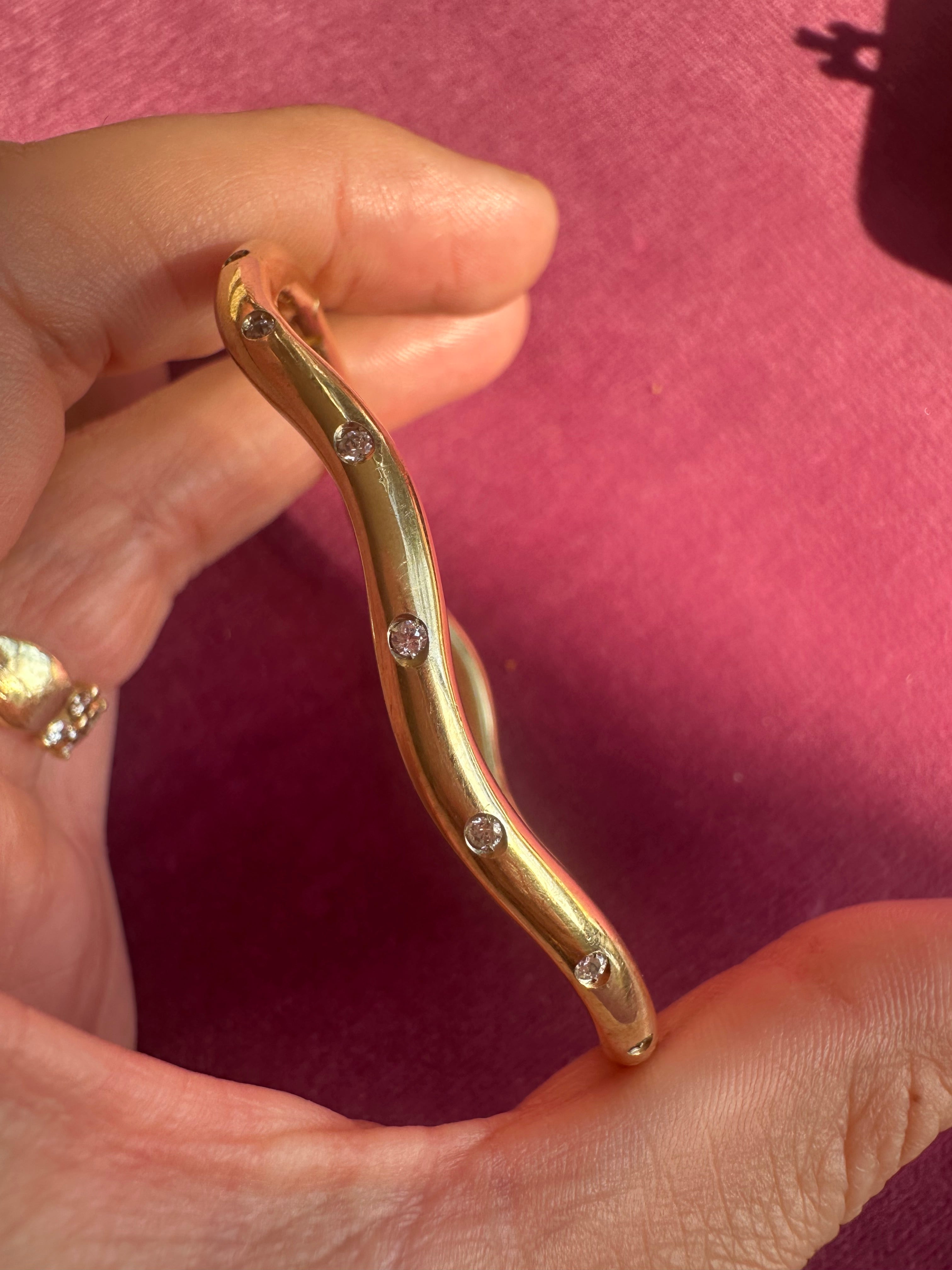 wavy diamond bangle