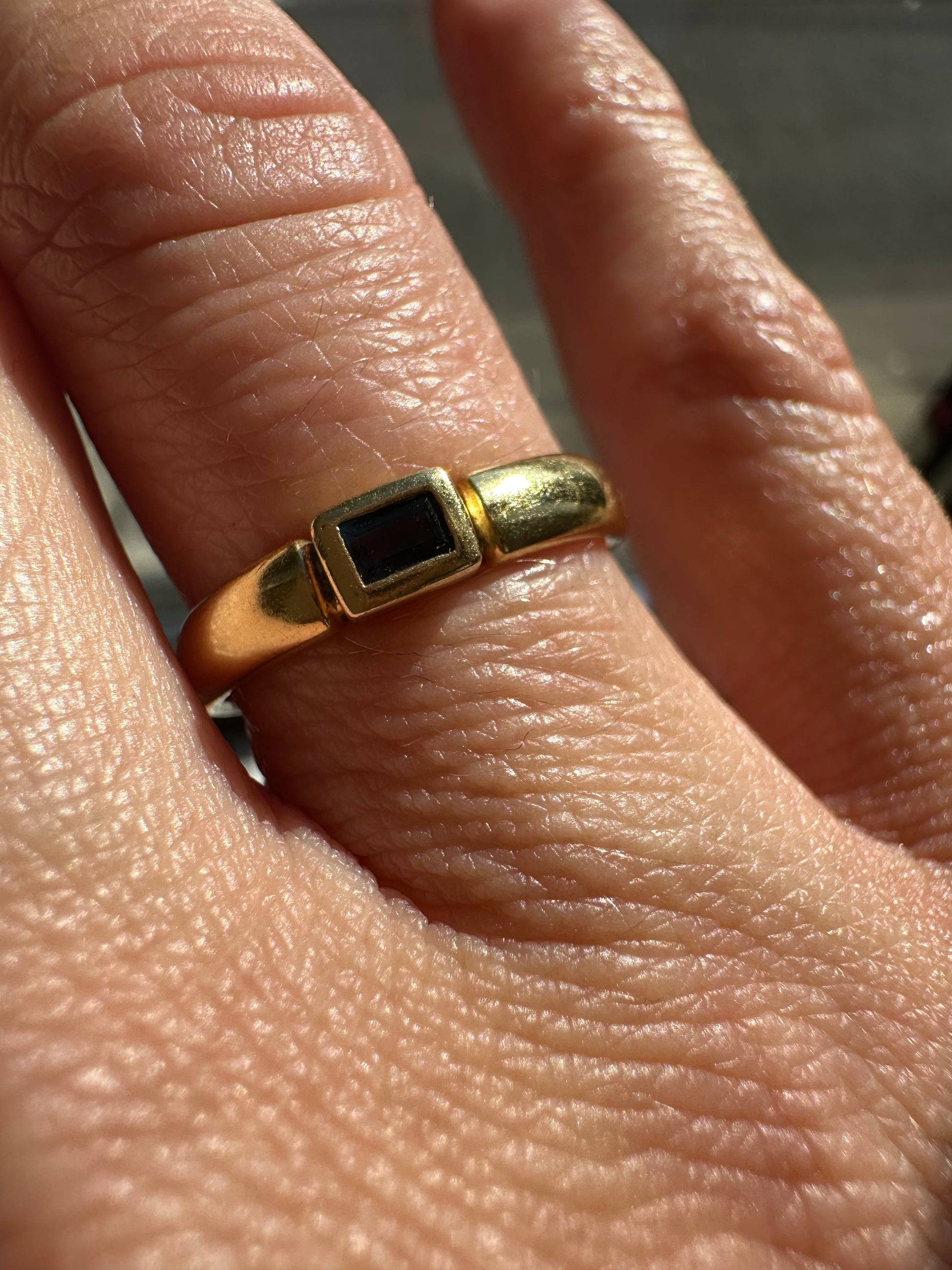 east west bezel set sapphire band
