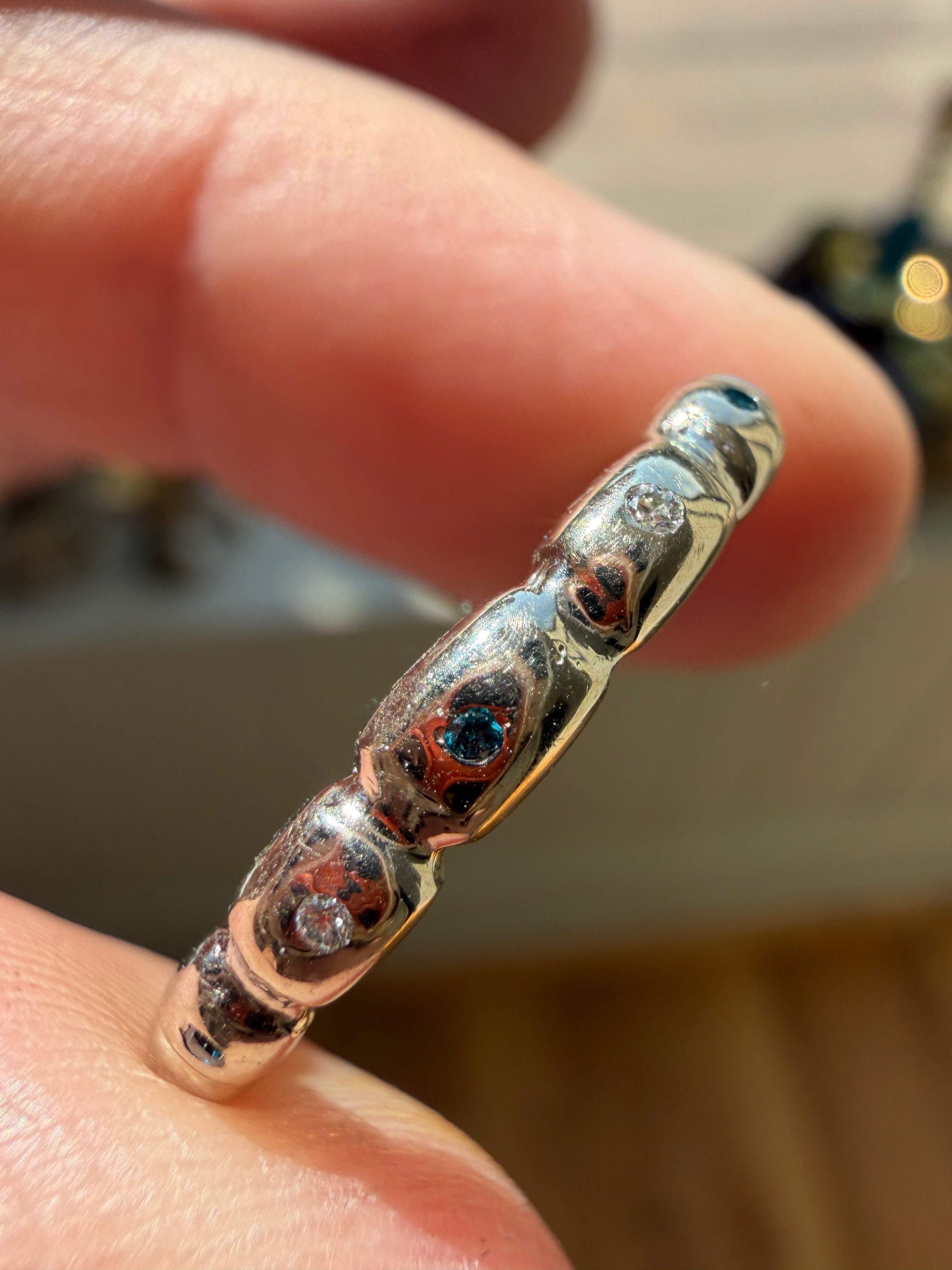 white gold bead band with blue and white diamonds