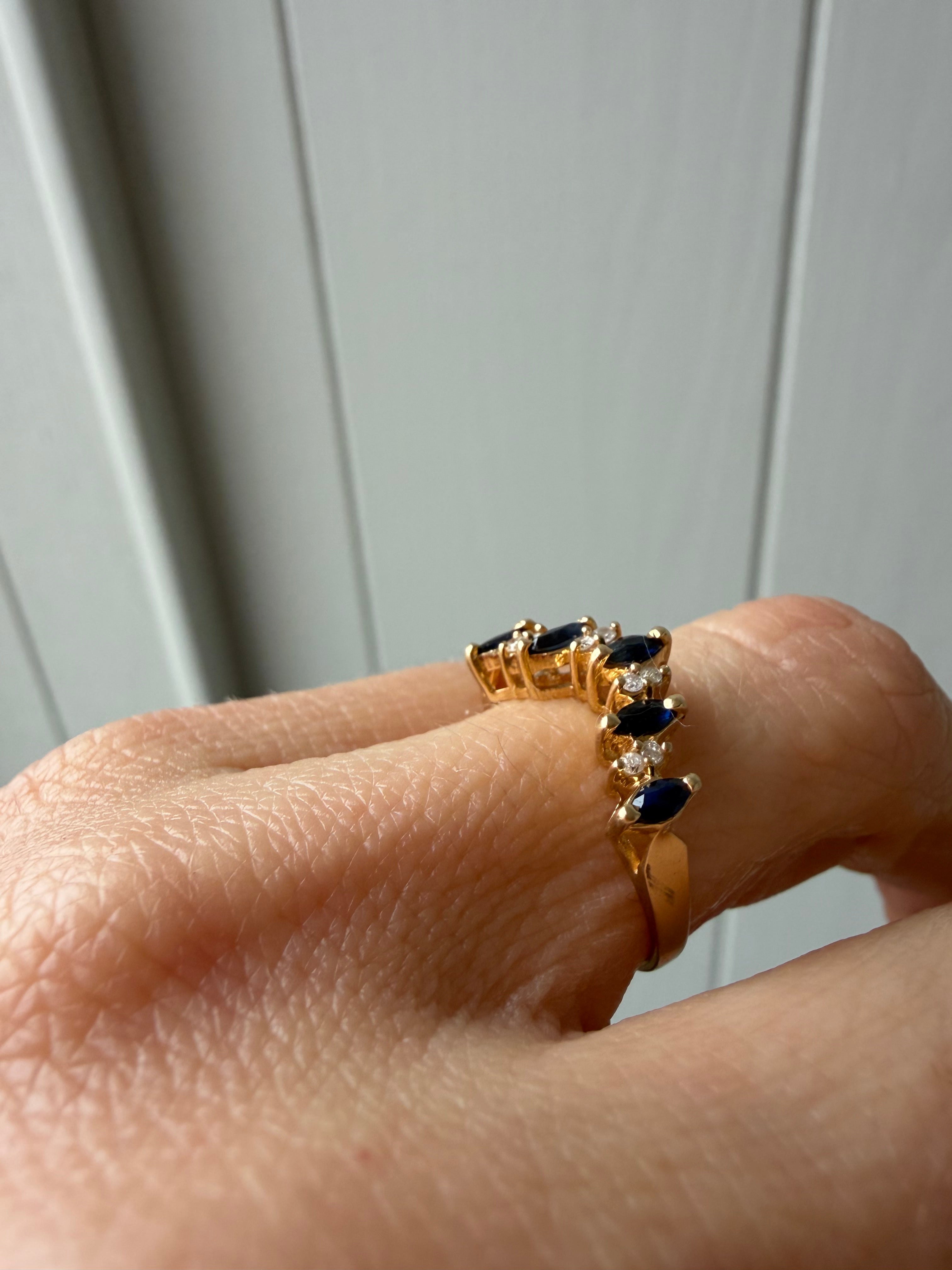 V shaped diamond and sapphire ring