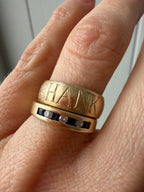 channel set sapphire and diamond band