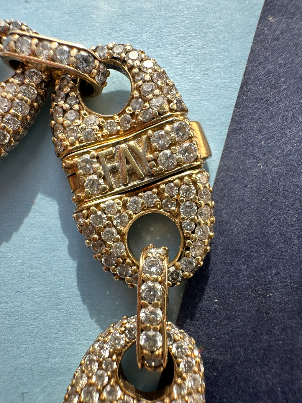 diamond covered gucci link bracelet