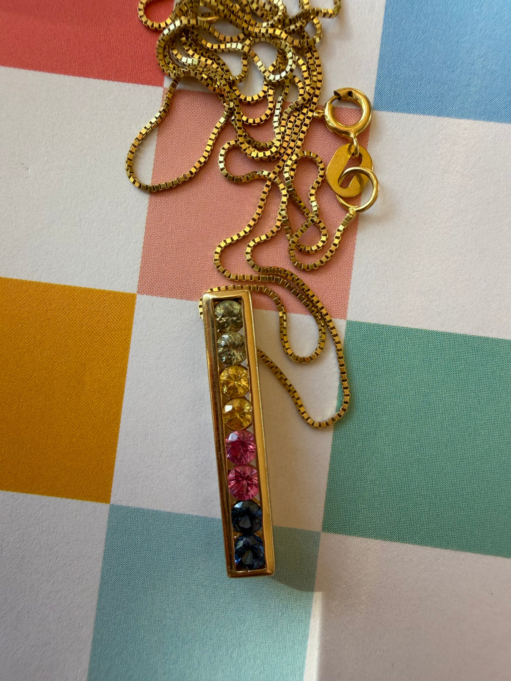 rainbow sapphire pendant on 18” box chain