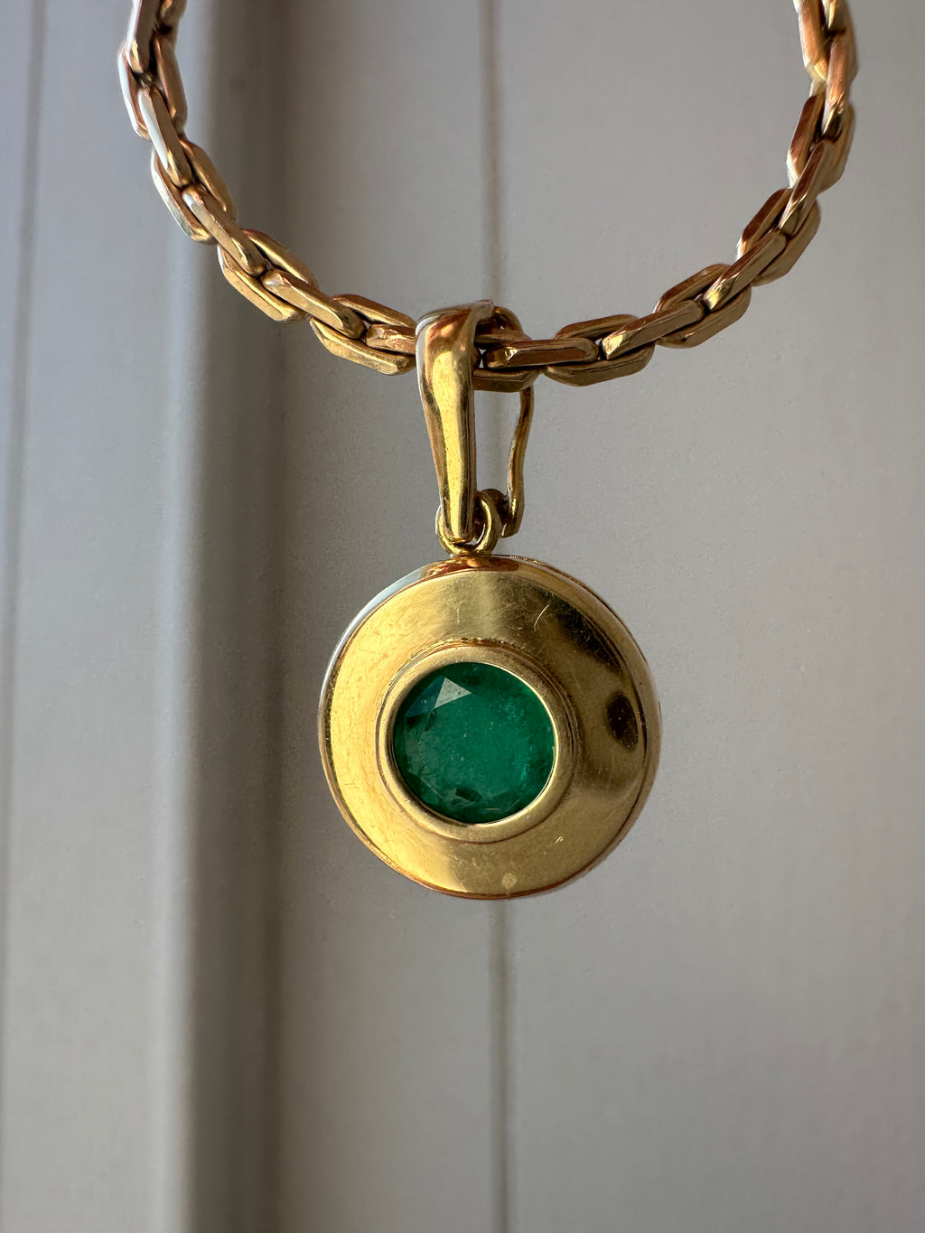 emerald in 18k bezel