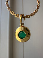 emerald in 18k bezel