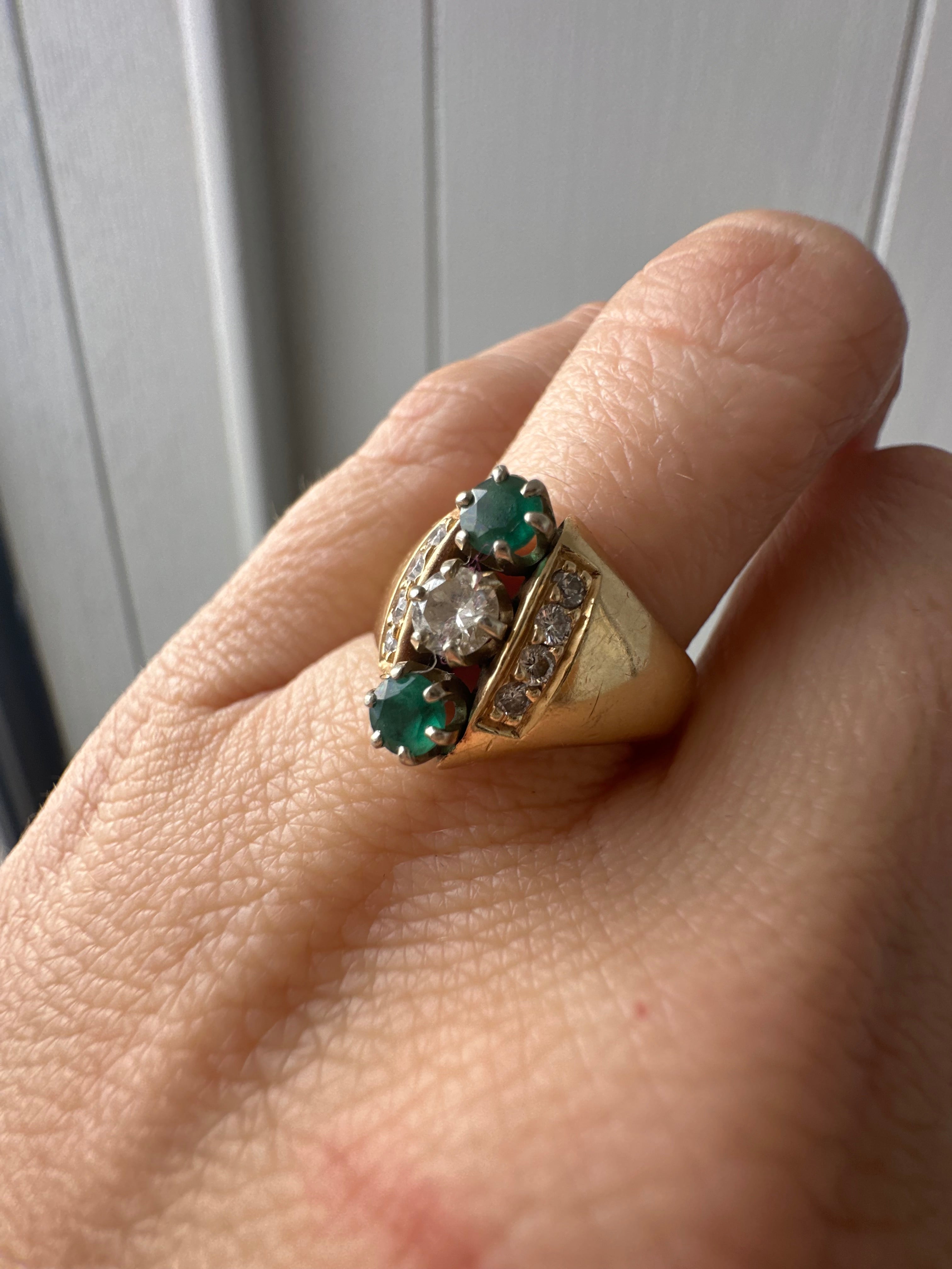 emerald and diamond navette style ring