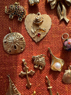 plethora of vintage gold charms