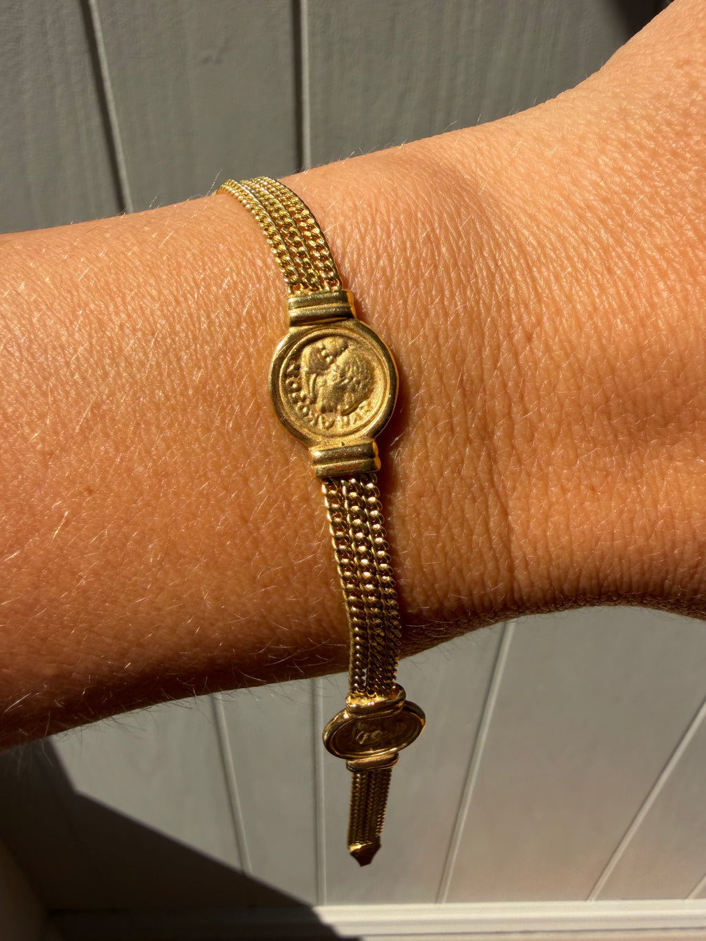 double sided coin and curb chain bracelet