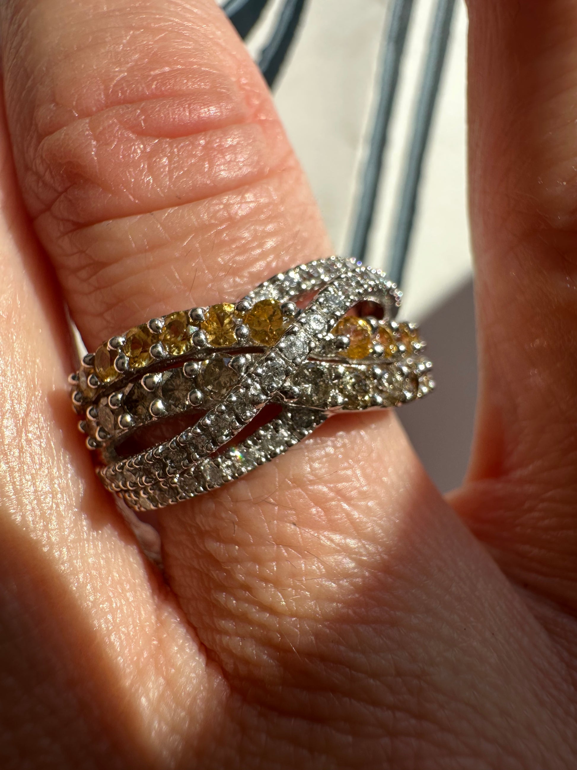 yellow sapphire and diamond crossover ring