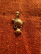 plethora of vintage gold charms