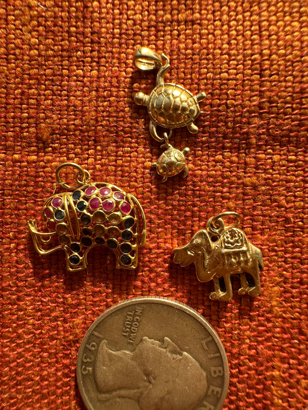 plethora of vintage gold charms