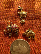 plethora of vintage gold charms