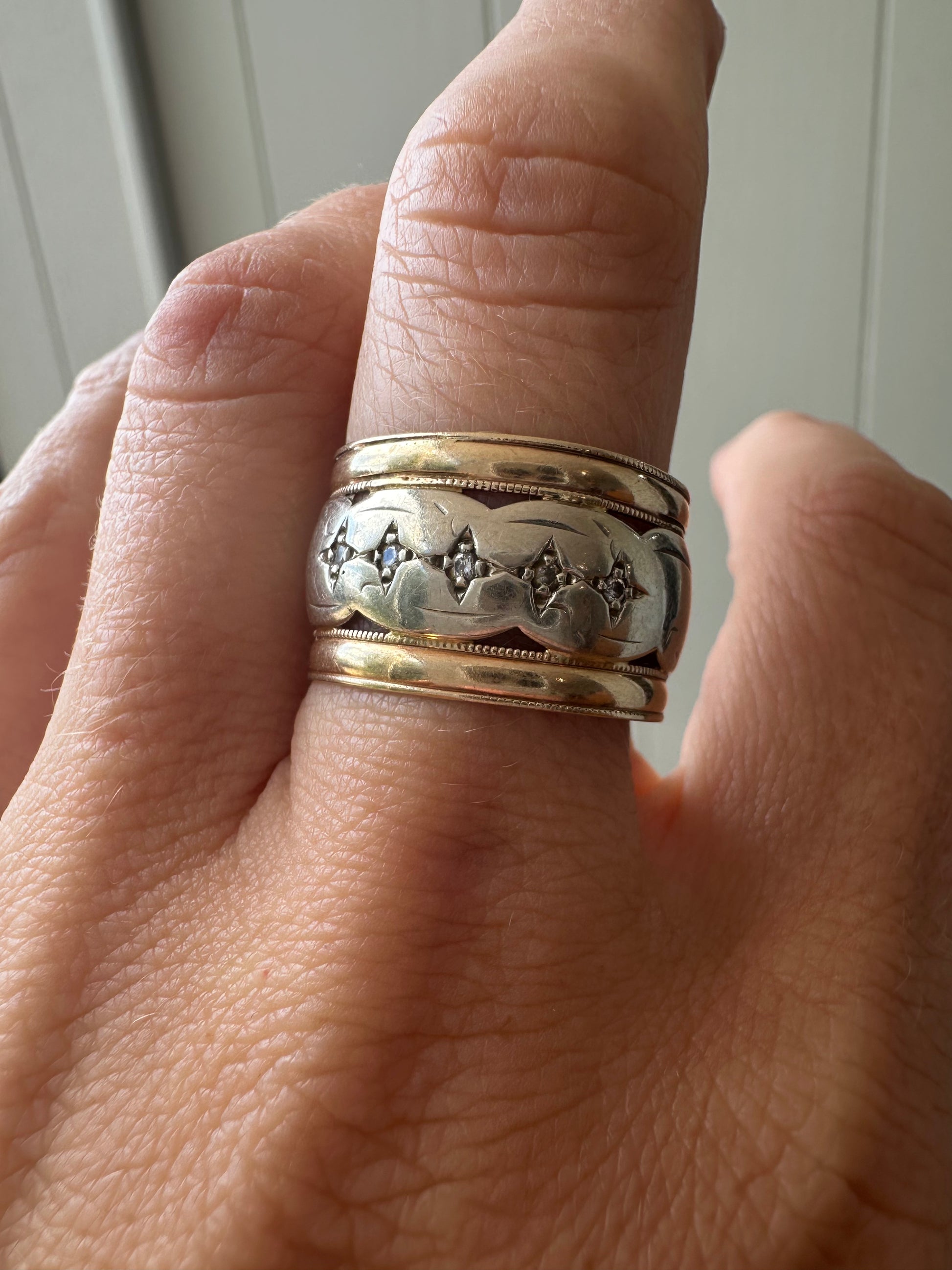 wide two tone band with star set diamonds