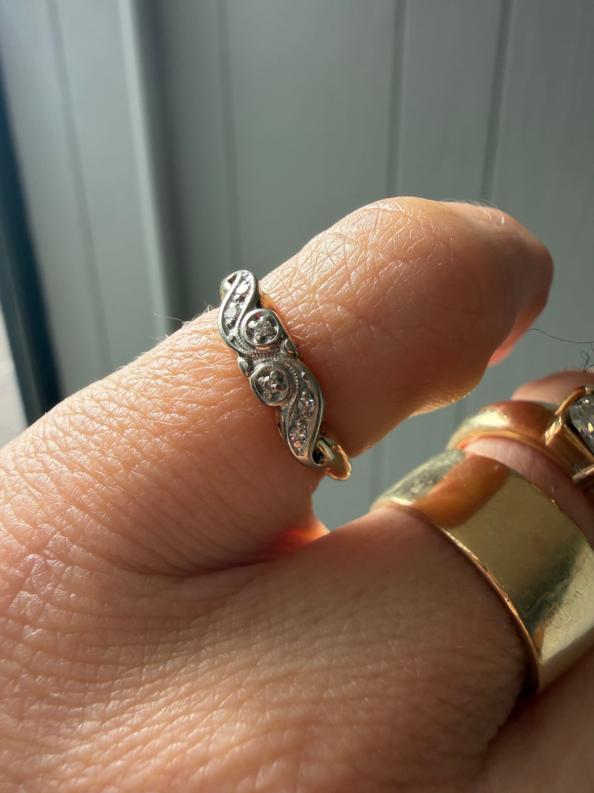 two tone swirl band with tiny diamonds