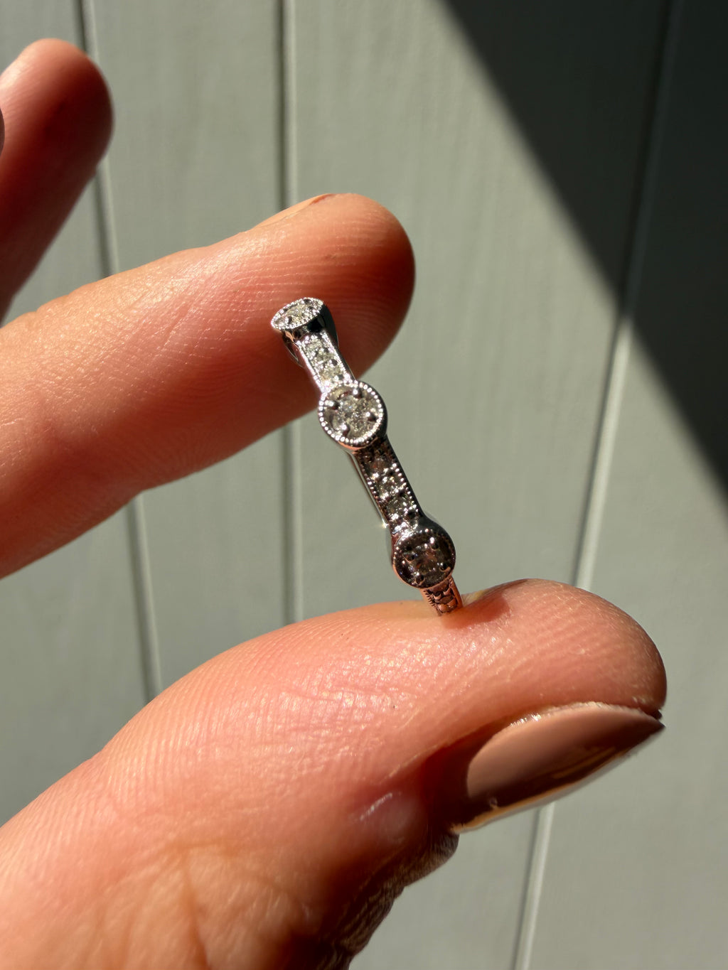 white gold and bezel set milgrain diamonds