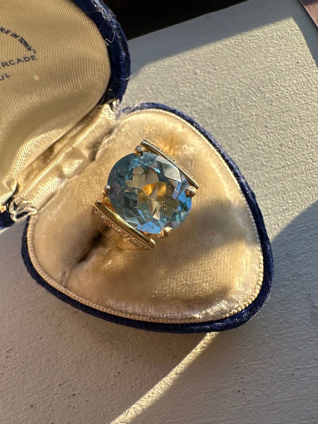 showstopper blue topaz and diamond ring