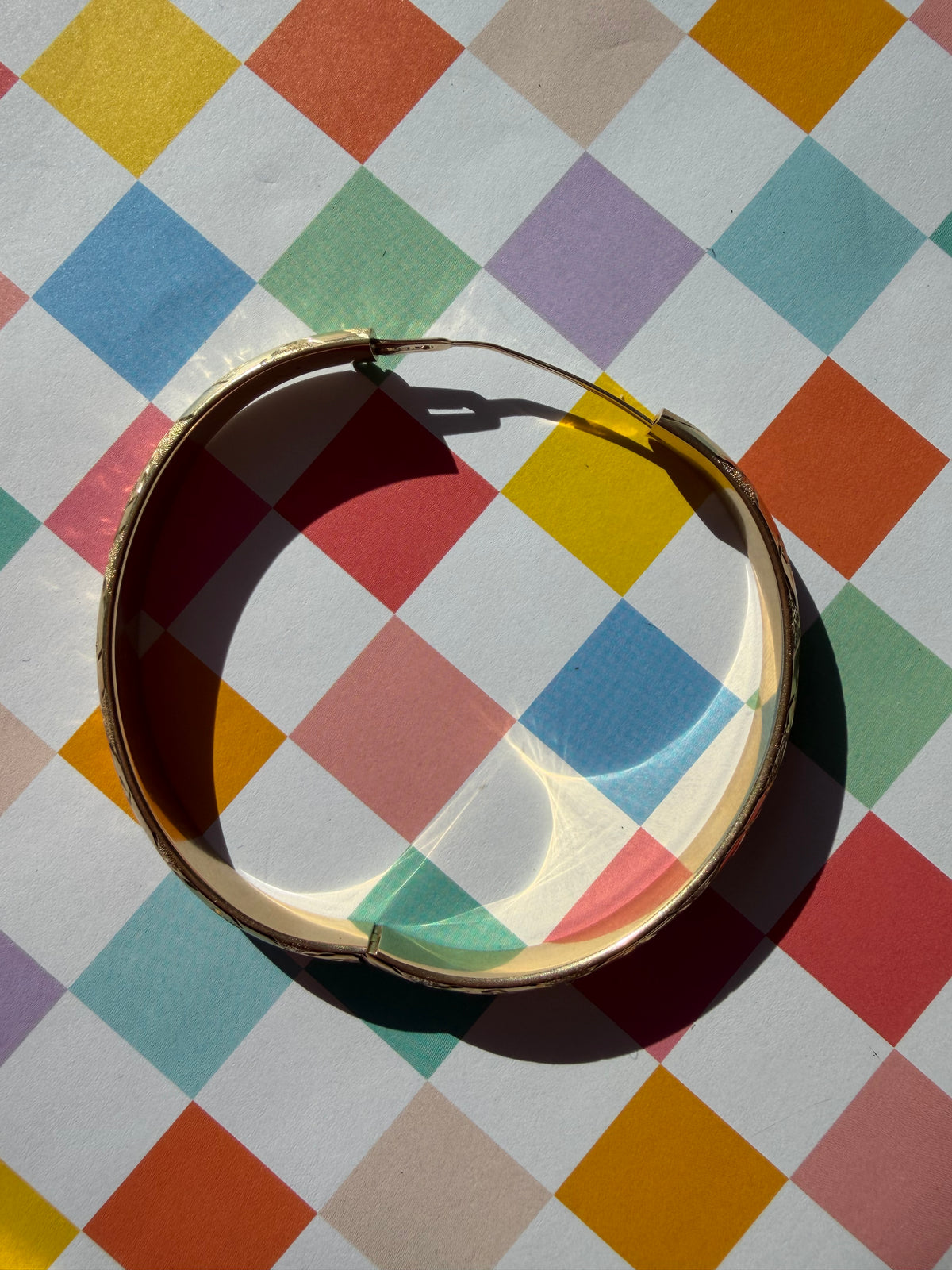 X etched hidden hinge bangle