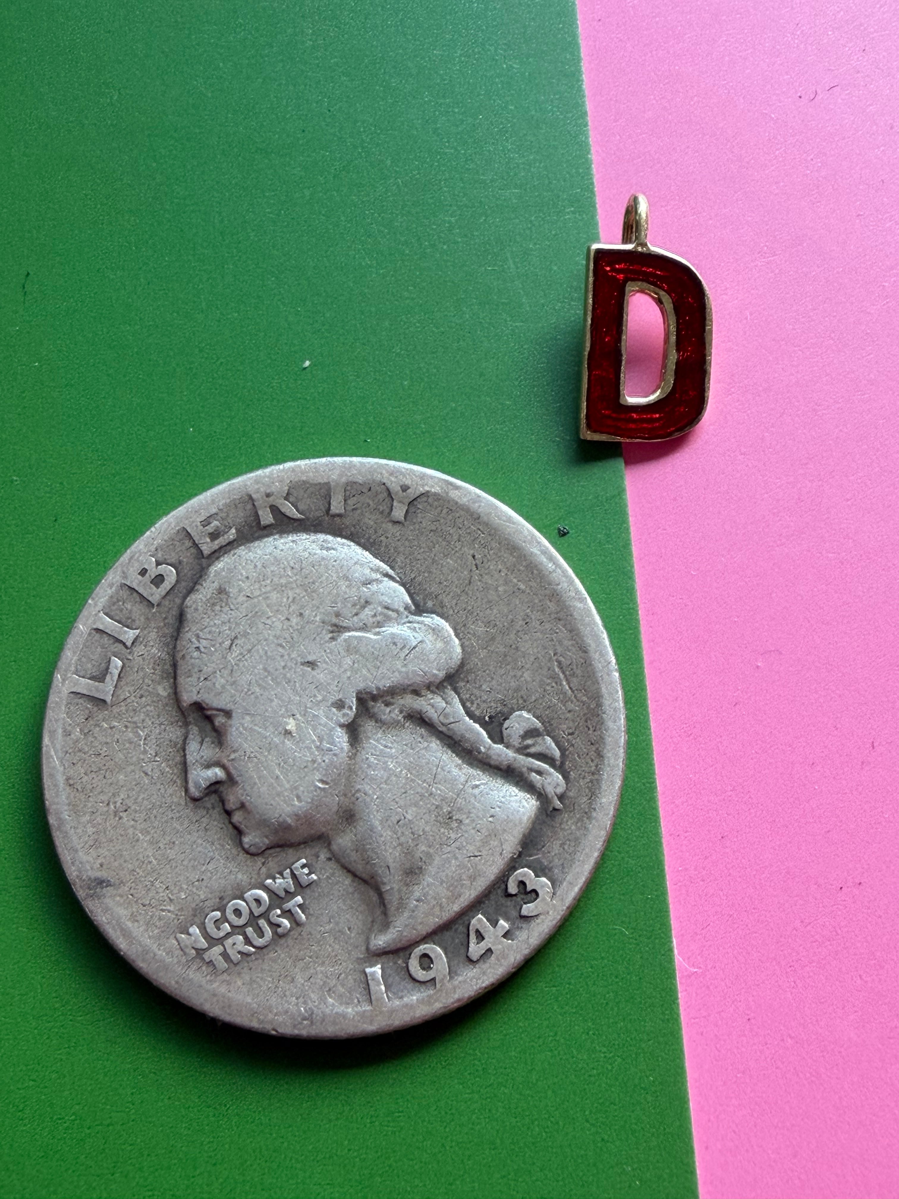 red enamel letter D