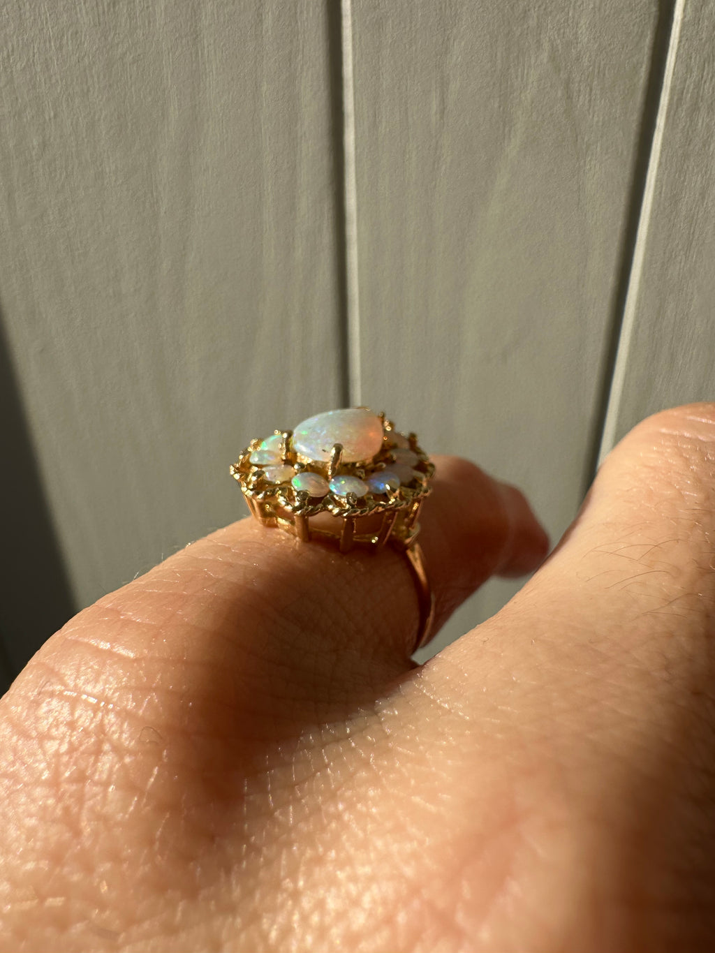 pear opal with opal halo cocktail ring
