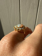 pear opal with opal halo cocktail ring