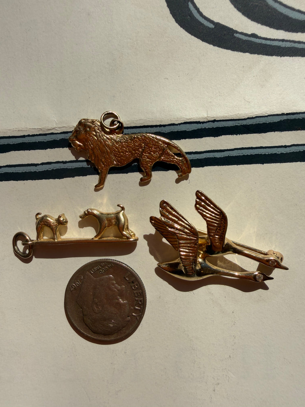 lion, dog + cat, pair of geese