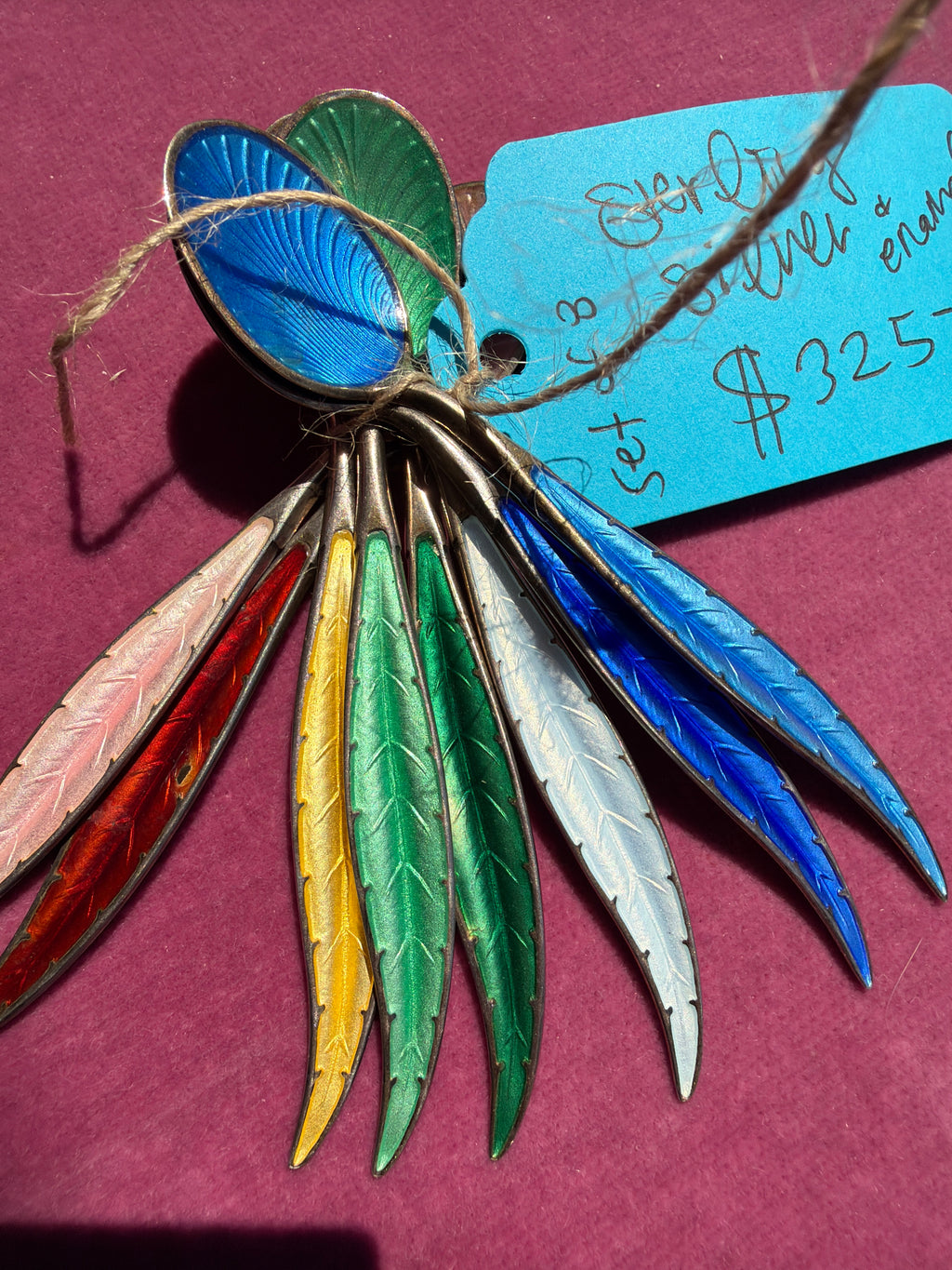 sterling silver and enamel spoons