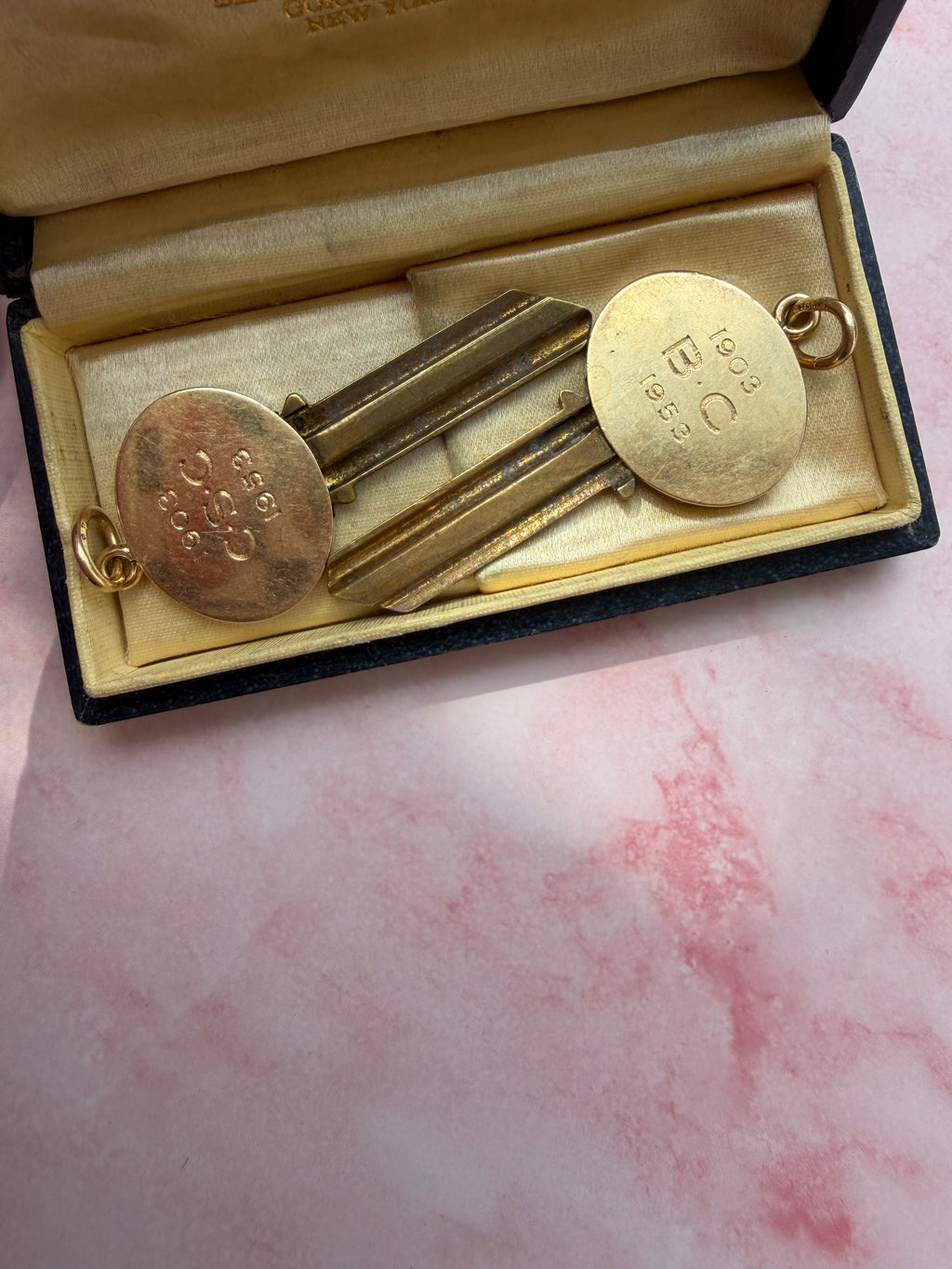 antique oval key pendant by Tiffany & Co.