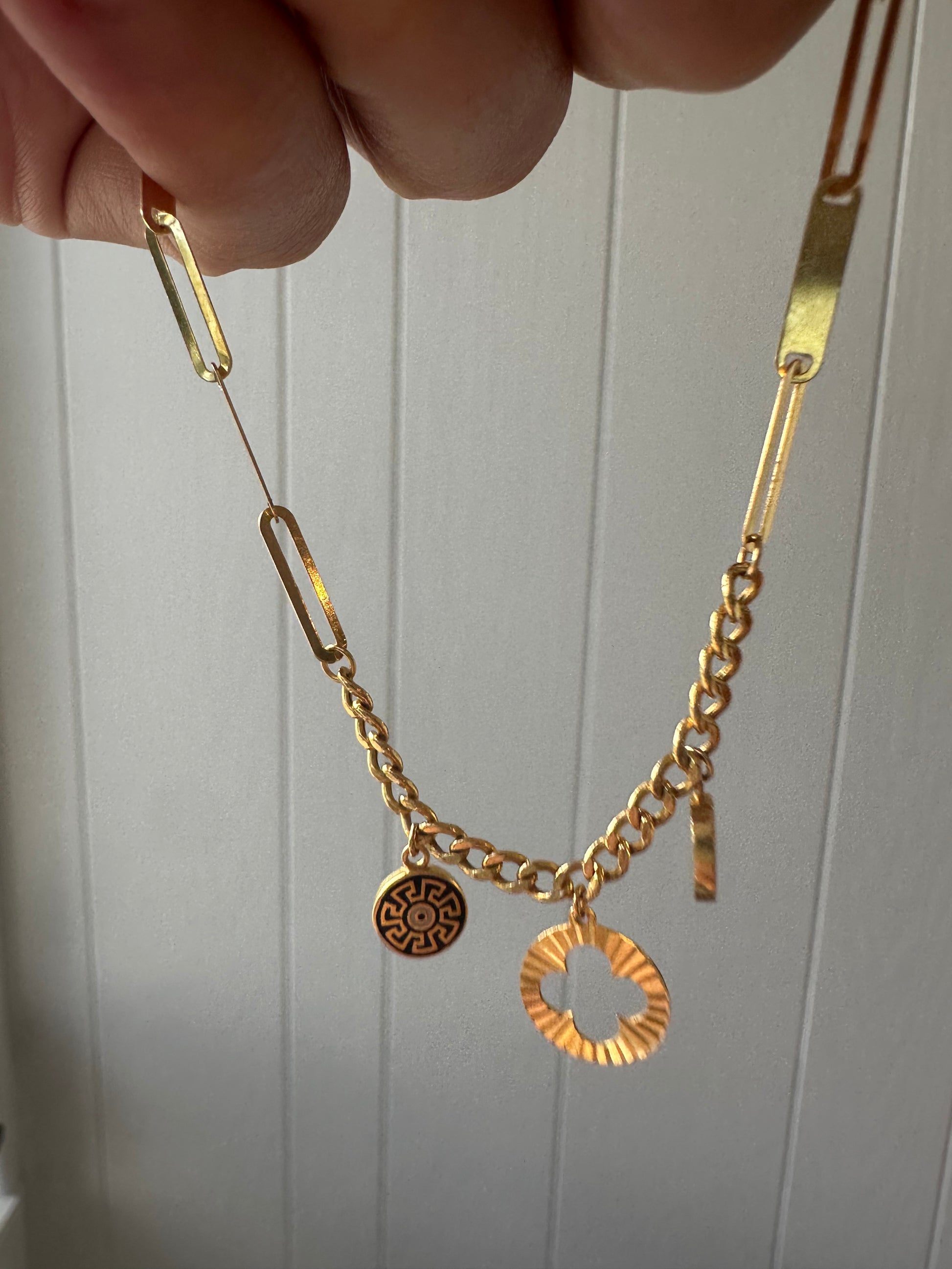 21k gold paperlink and curb charm bracelet