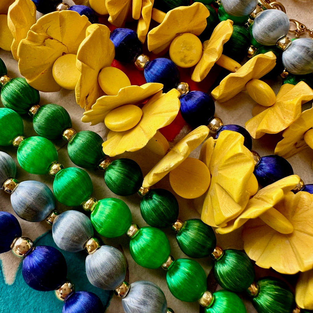 Colorful thread beads with gold plated bead strands