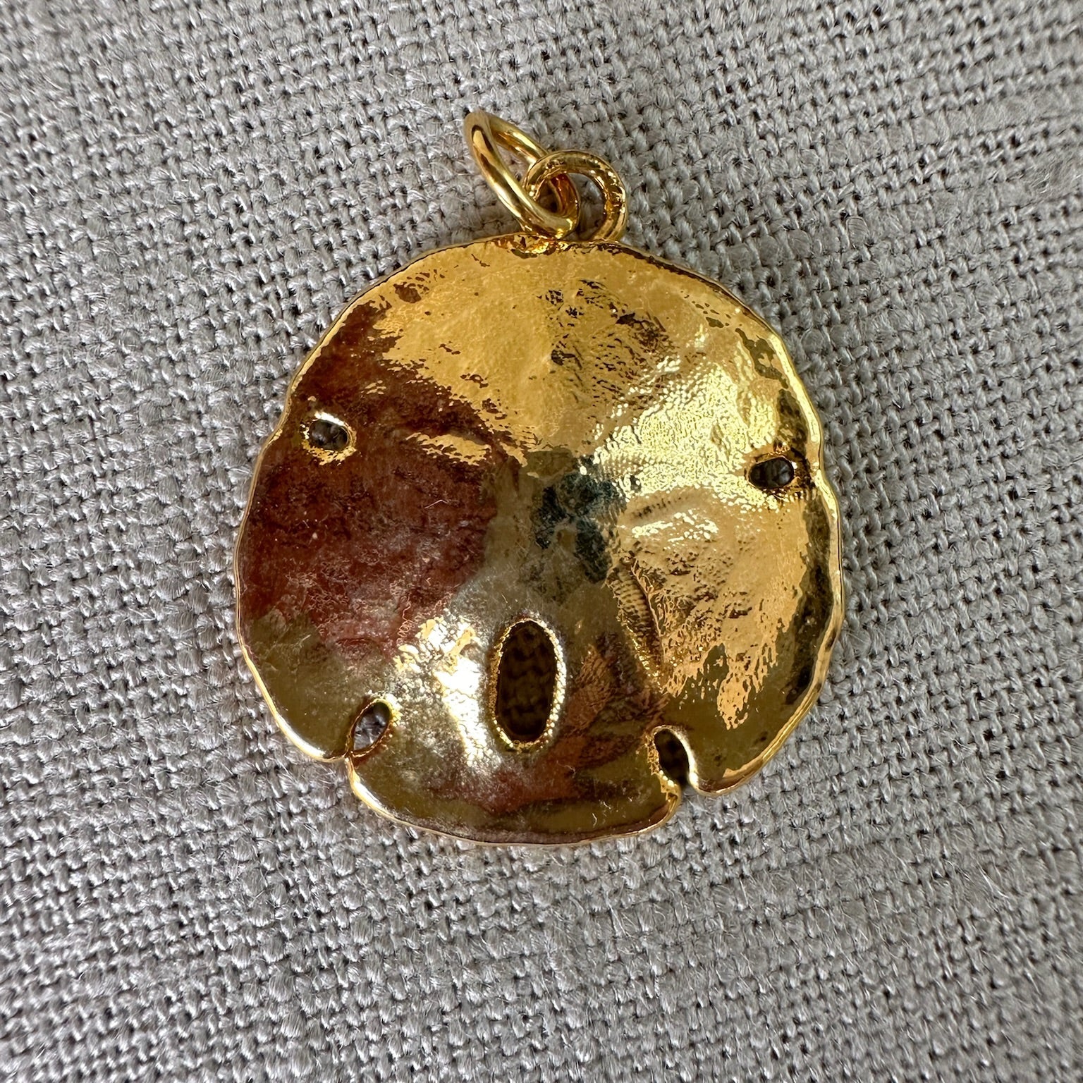 Vintage gold plated sand dollar pendant