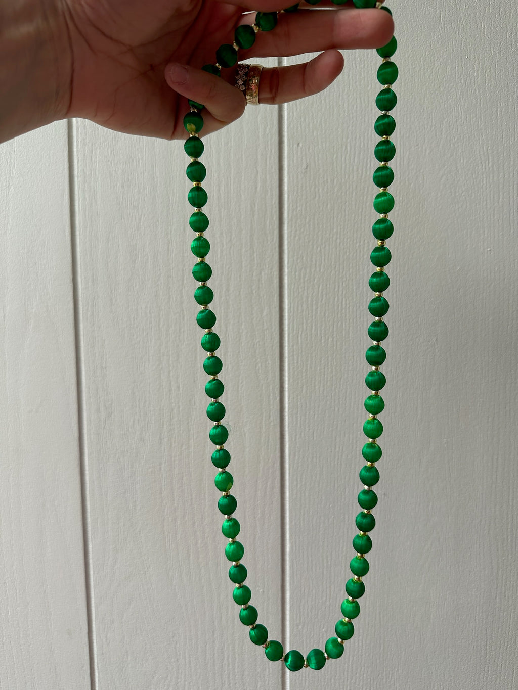 Colorful thread beads with gold plated bead strands