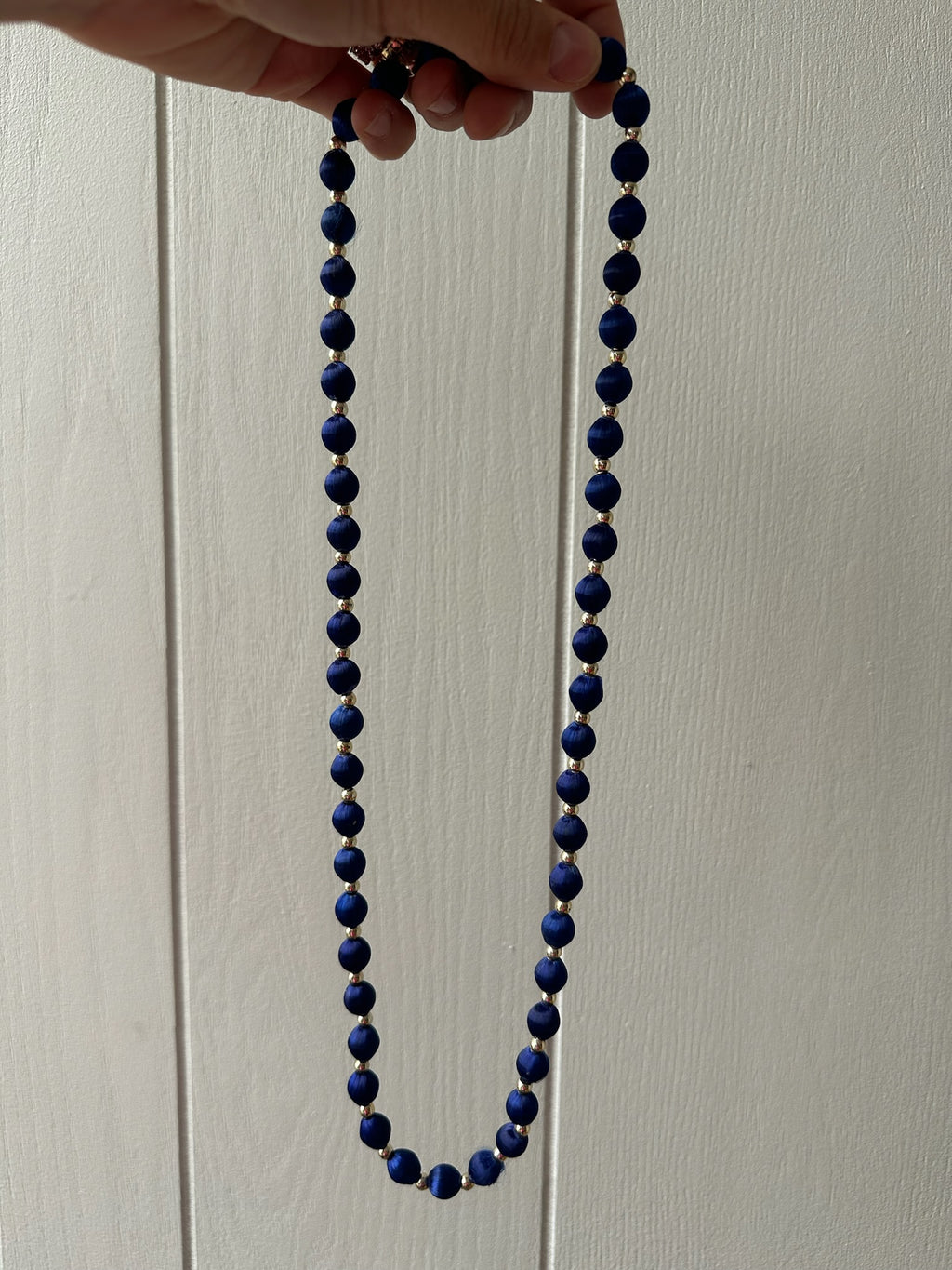 Colorful thread beads with gold plated bead strands