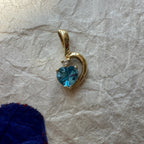 Bright Blue Topaz Swirl Pendant