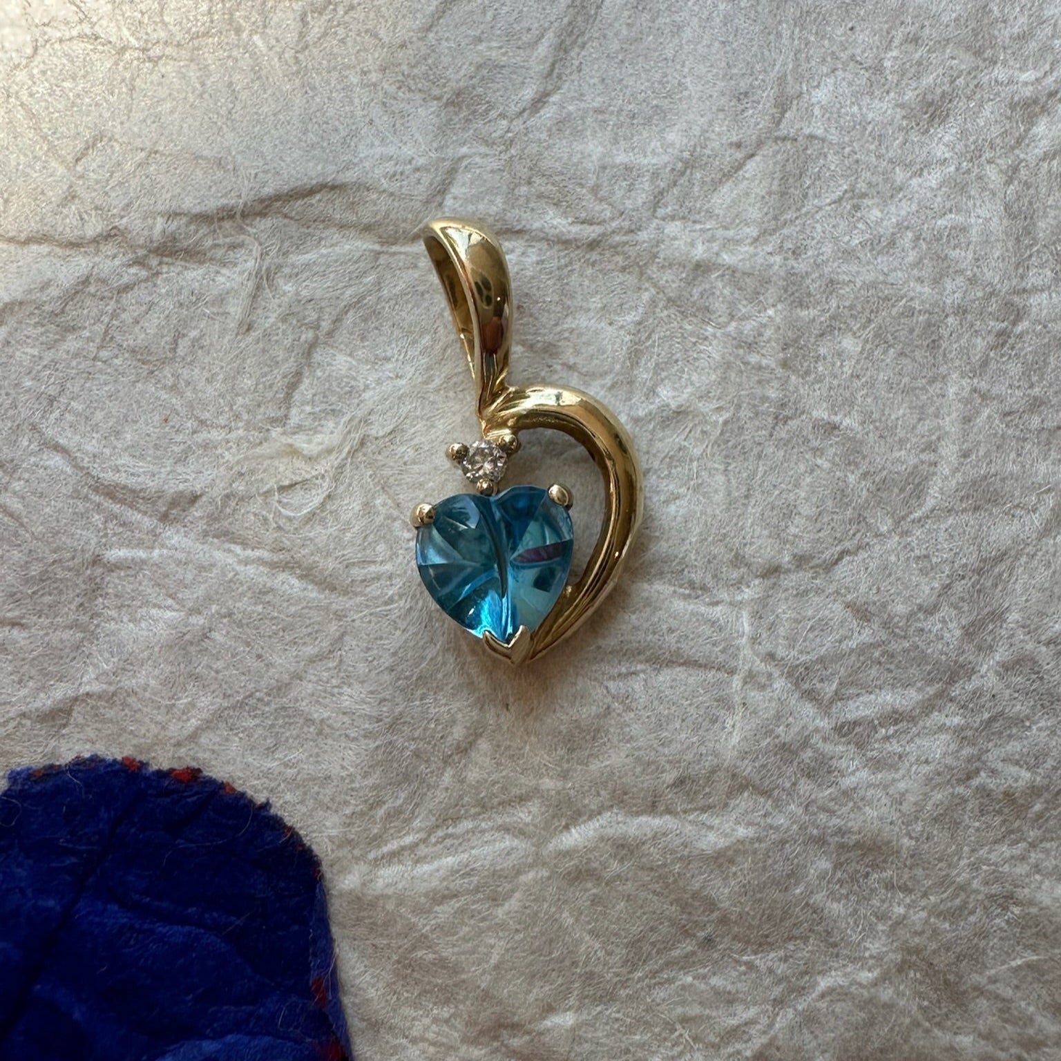 Bright Blue Topaz Swirl Pendant