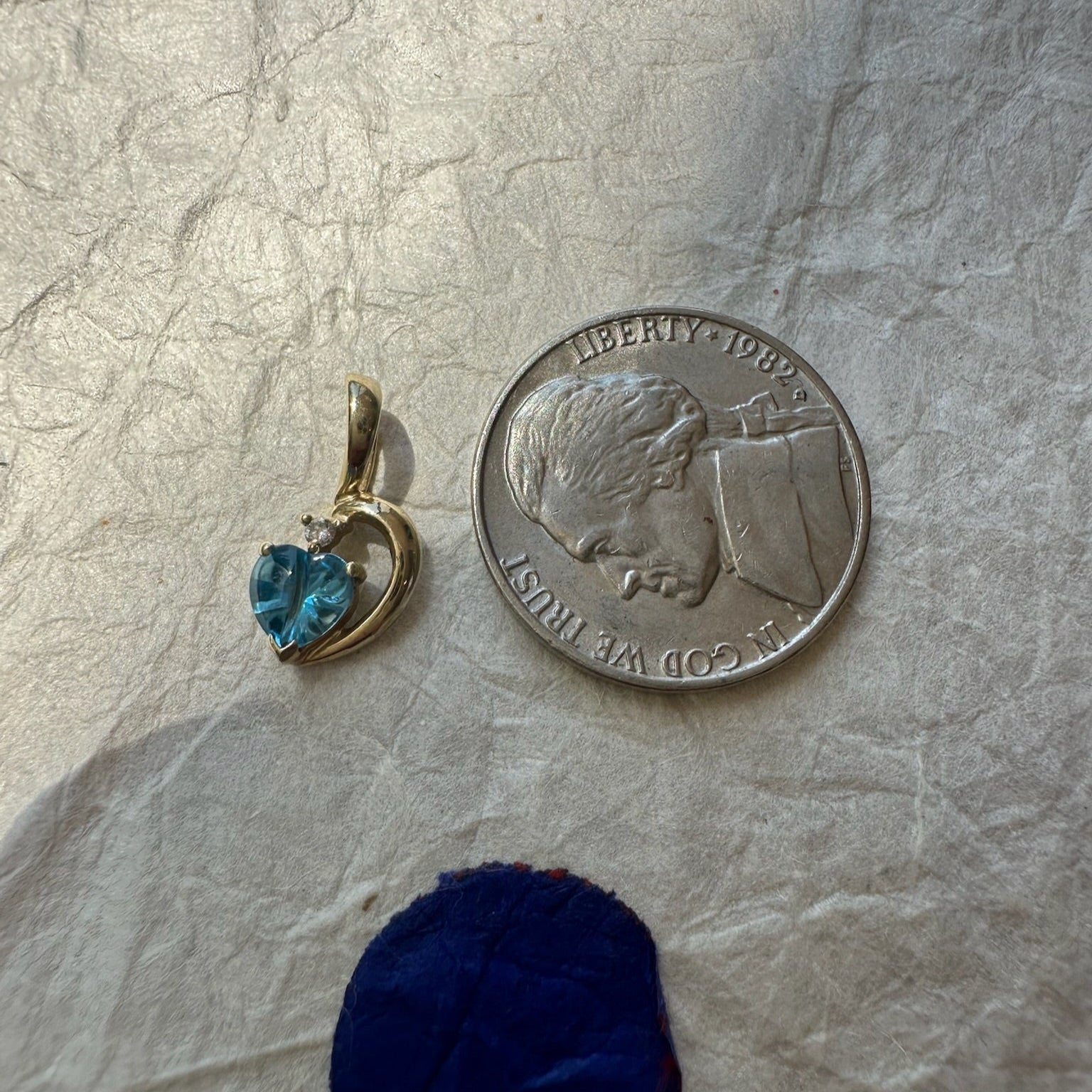 Bright Blue Topaz Swirl Pendant
