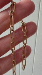 18k gold oval link with puffy elephant bracelet
