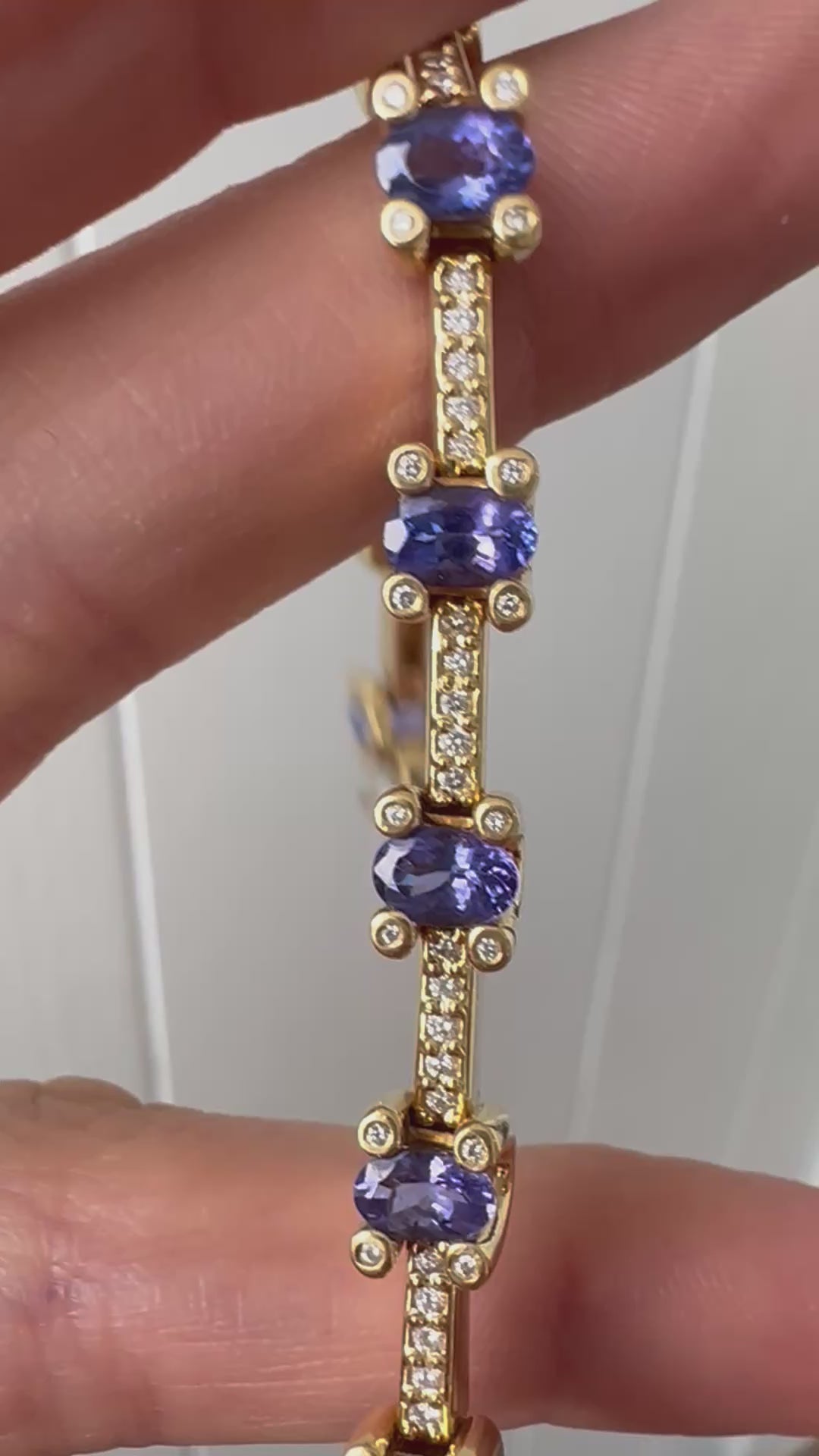 gorgeous tanzanite and diamond 18k gold bracelet