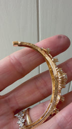 striking engraved opal burst hinge bangle