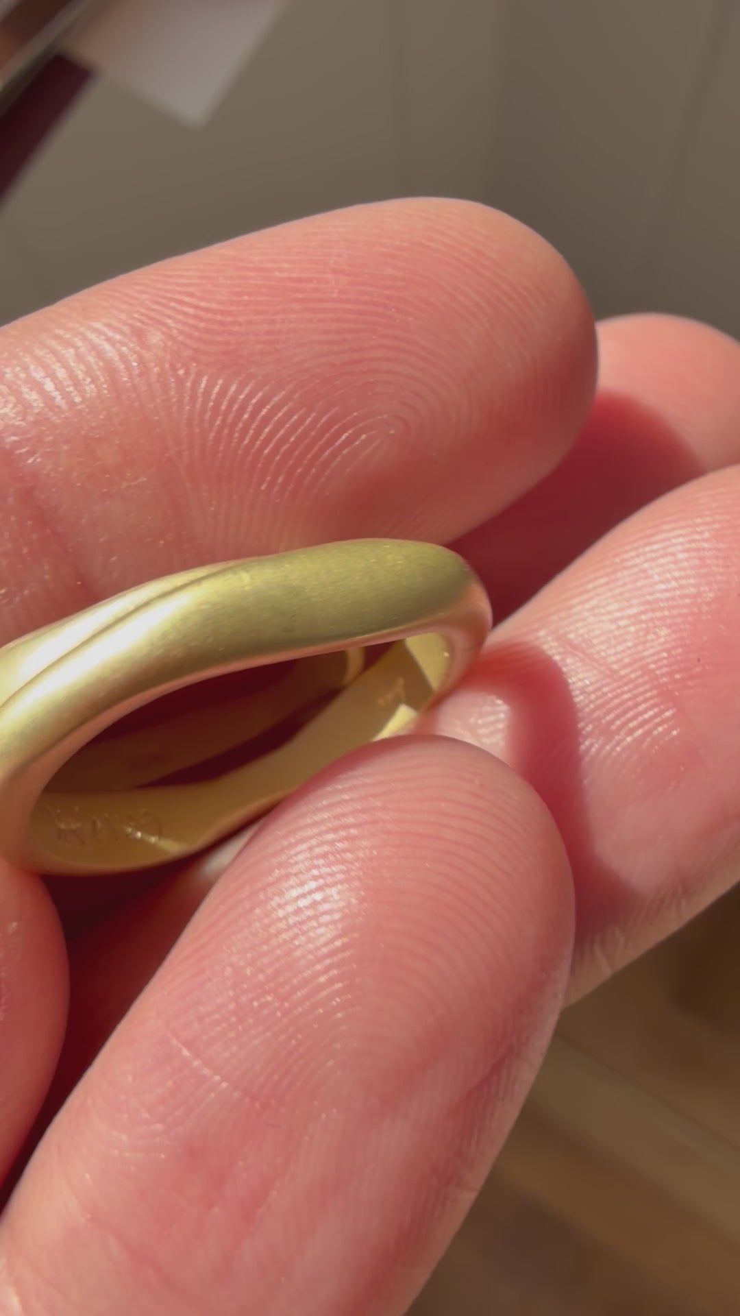 pair of 18k matte gold finish bands