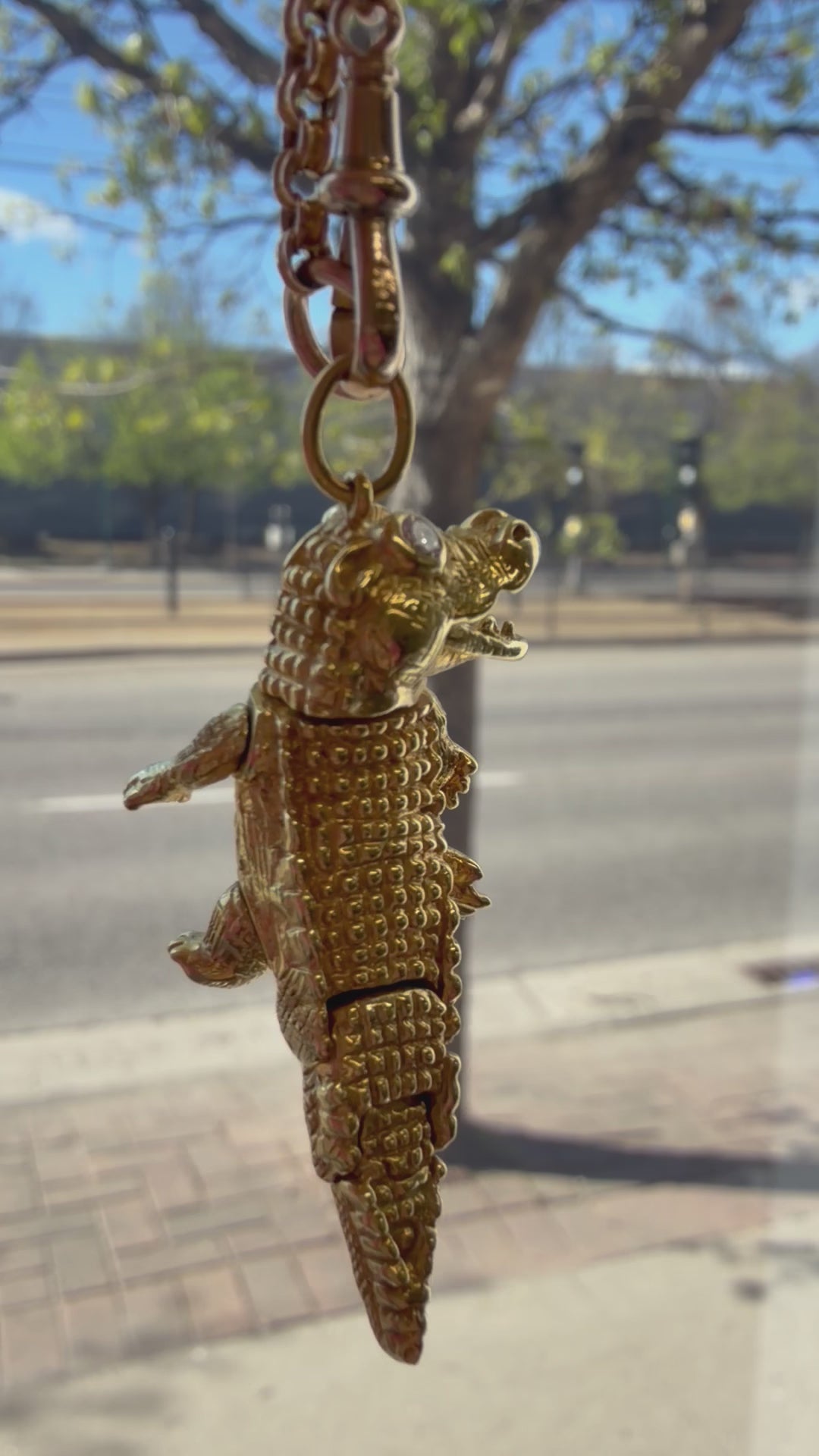 articulated alligator with diamond eyes