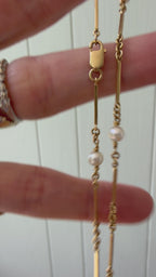 pearl and 18k gold station chain