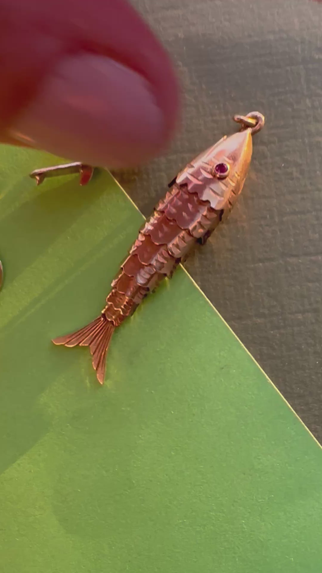 big articulated fish with ruby eyes