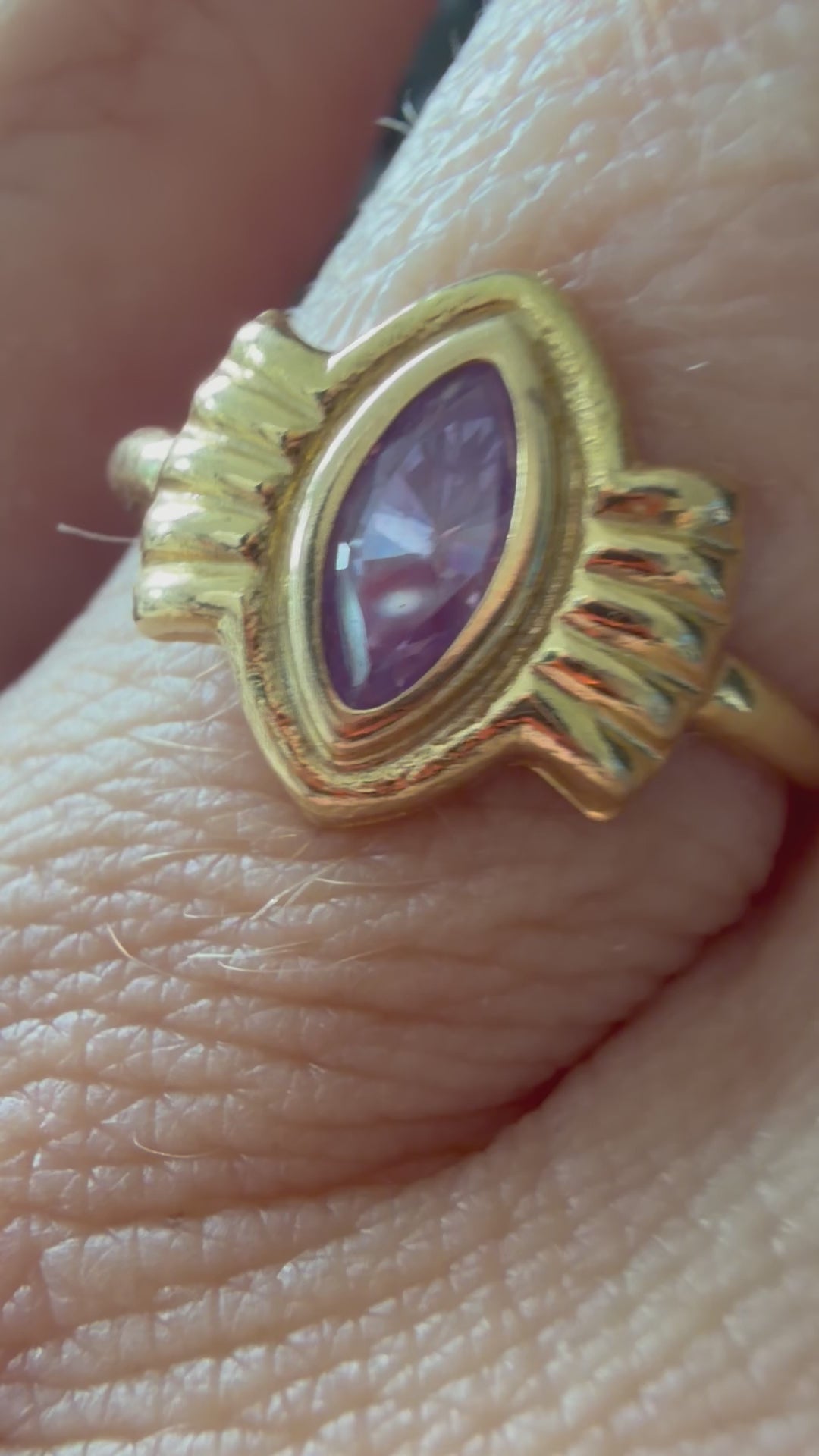 18k gold and purple stone