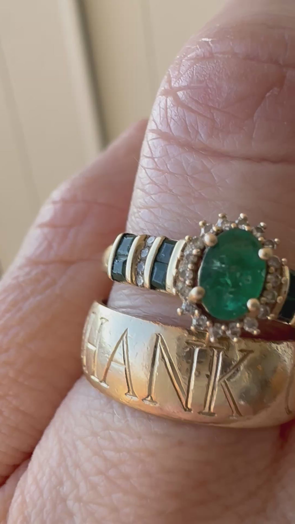 oval cut emerald with diamond halo ring